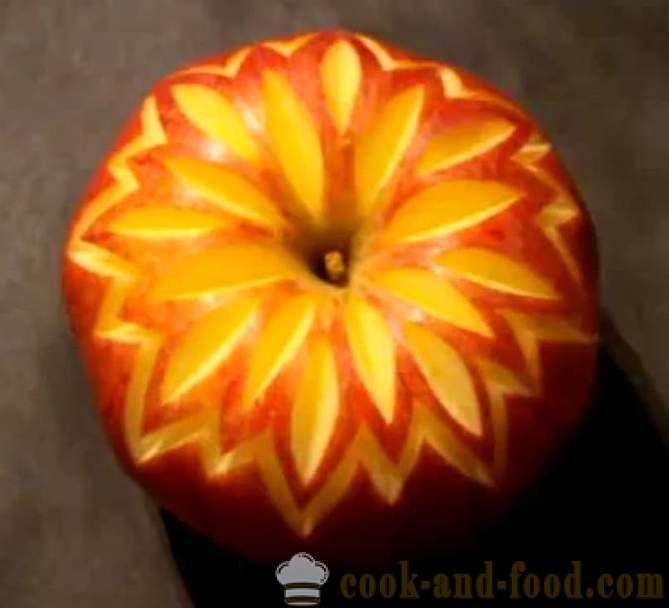 Decoratiuni de fructe pentru feluri de mâncare, tort, de masă sau sculptură dintr-un măr cu o fotografie, video